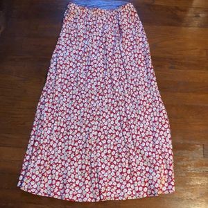 a red shirt with white flowers. worn once.